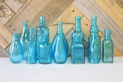 blue coloured vintage bottles