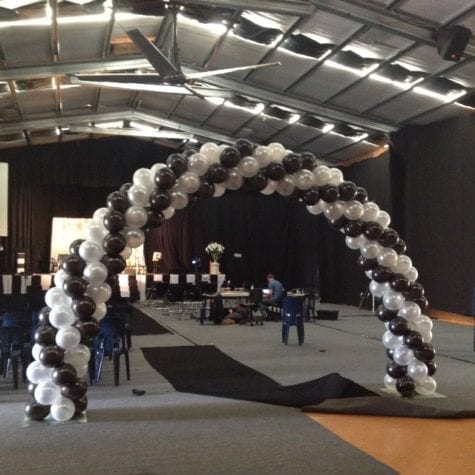 black, white and silver balloon arch