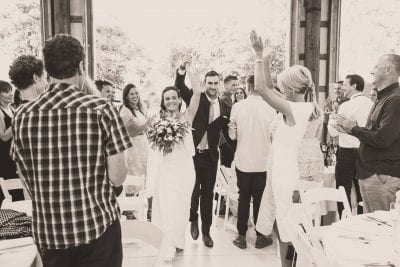 bride and groom entrance into their shed wedding