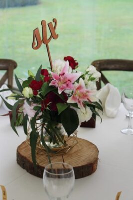 geometric vase with ruby toned blooms